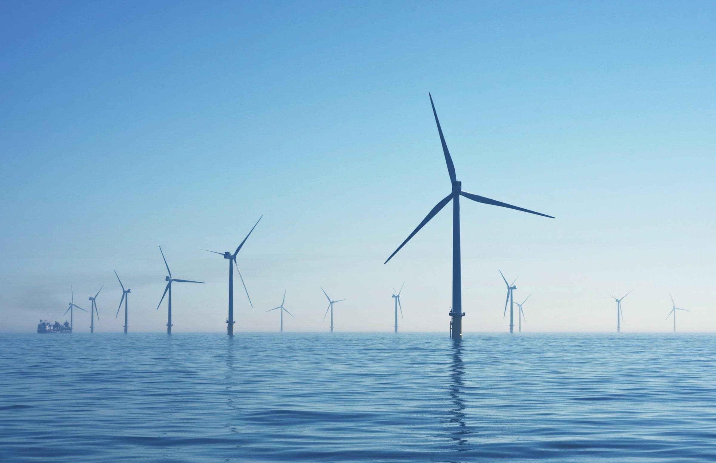 Offshore wind turbines standing in open water